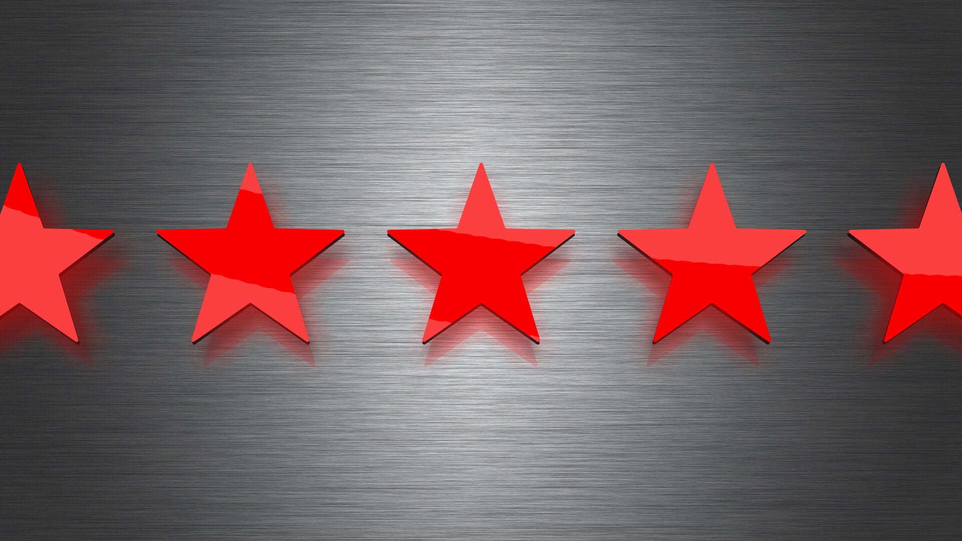 Five red stars on chrome metal background