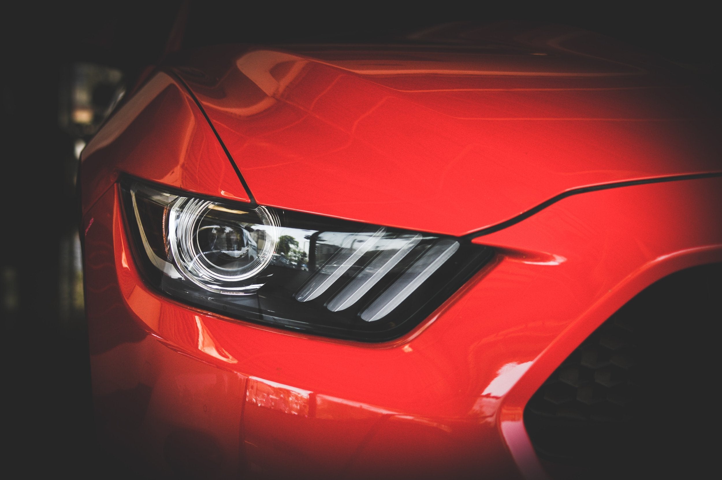 Closeup of red vehicle headlight