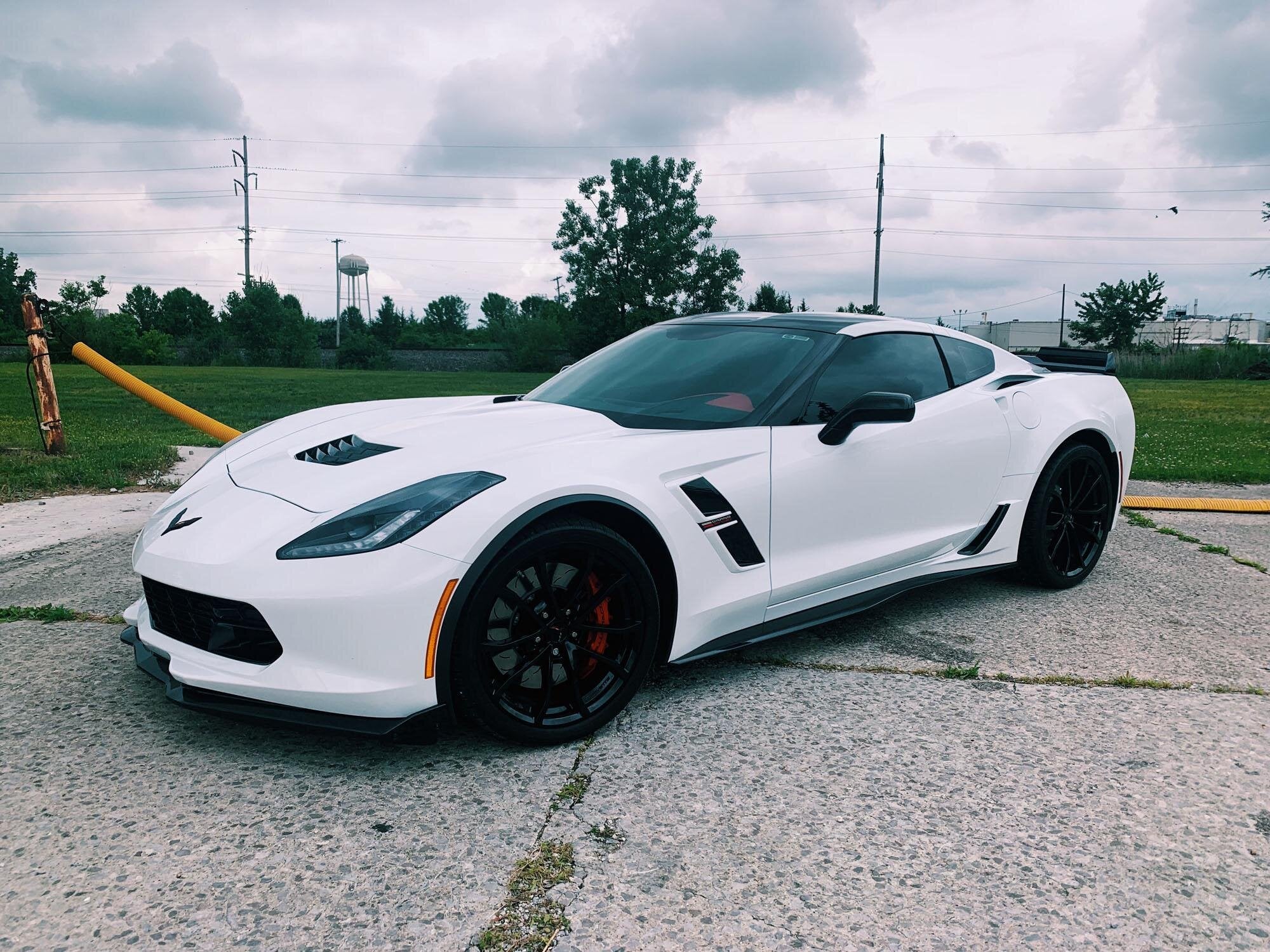 White vehicle with customization and window tint