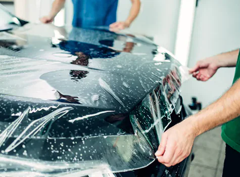 Auto Addition crew installs paint protection film