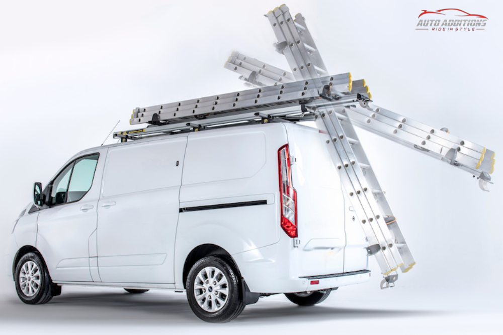 White van shows demo on how to deploy ladder from roof top