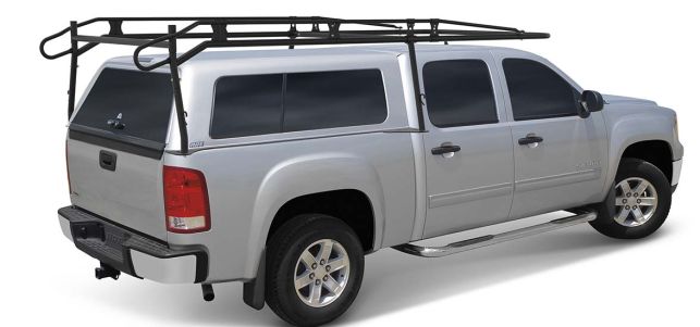 A pickup truck featuring a sturdy rack on its roof for carrying extra loads.