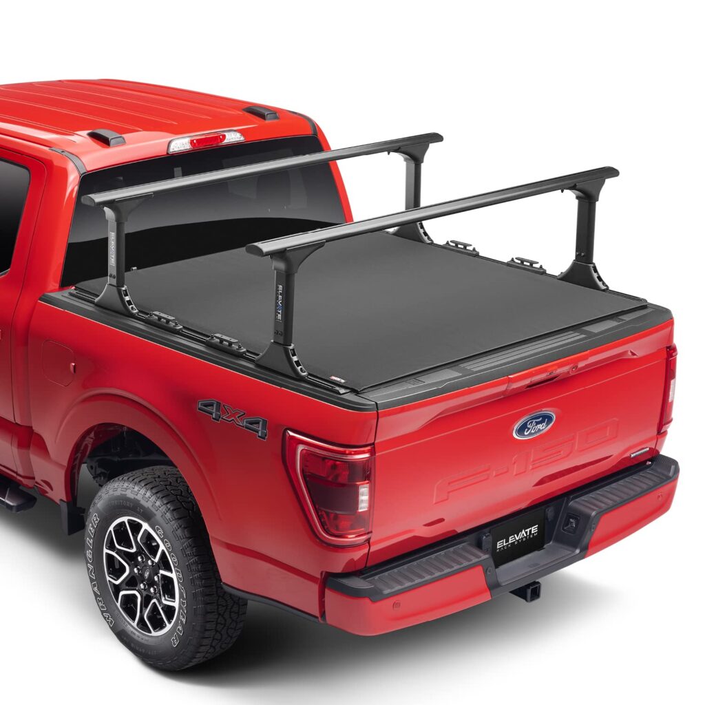 Ford Red truck bed with a rack on top, showcasing its utility and design.
