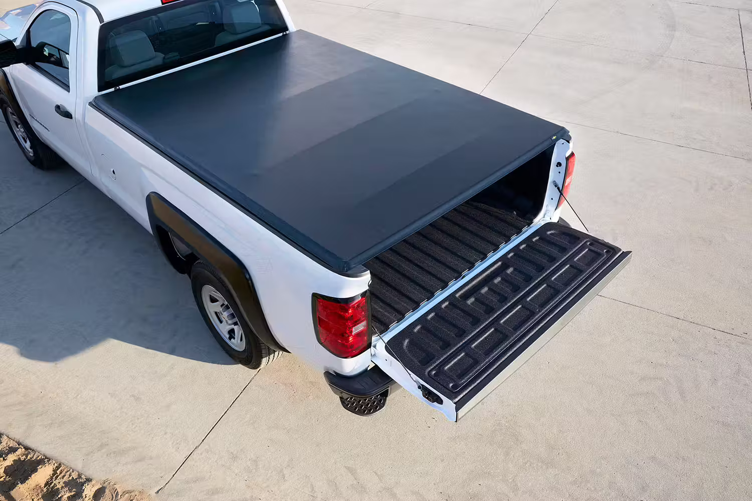 White pick-up truck with tailgate open